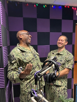 250604-N-TY711-5544 SIGONELLA, Italy. (June 4, 2025) Captain TaRail A. Vernon, Commanding Officer of U.S. Naval Hospital Sigonella, hosts a Patient Informational Minute segment on AFN Sigonella, joined by Cmdr. Radhames Lizardo, Director for Surgical Services and General Surgeon, to discuss the importance of colorectal cancer screenings. The broadcast, recorded on June 4 in Sigonella, Italy, underscores U.S. Naval Hospital Sigonella’s continued commitment to health and readiness. (U.S. Navy photo by Lieutenant Commander Brandi Gibson)