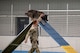 Staff Sgt. James Edwards, 319th Security Forces Squadron military working handler, leads Zorro, 319th SFS MWD, through a dog agility course during the inaugural Police Week Top Dog of the Tundra Competition at Grand Forks Air Force Base, N.D., May 13, 2025.