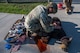 Senior Airman Caleb Manges, 319th Security Forces Squadron military working dog handler, trains in tactical combat casualty care on a Diesel Advanced Canine Medical Trainer at Grand Forks Air Force Base, N.D., May 13, 2025.
