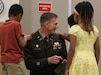 U.S. Army Col. Robert Andersen is pinned with his new rank by his children during his promotion ceremony at the Lexington Armory, May 30, 2025. (U.S. Army National Guard photo by Sgt. 1st Class Benjamin Crane)