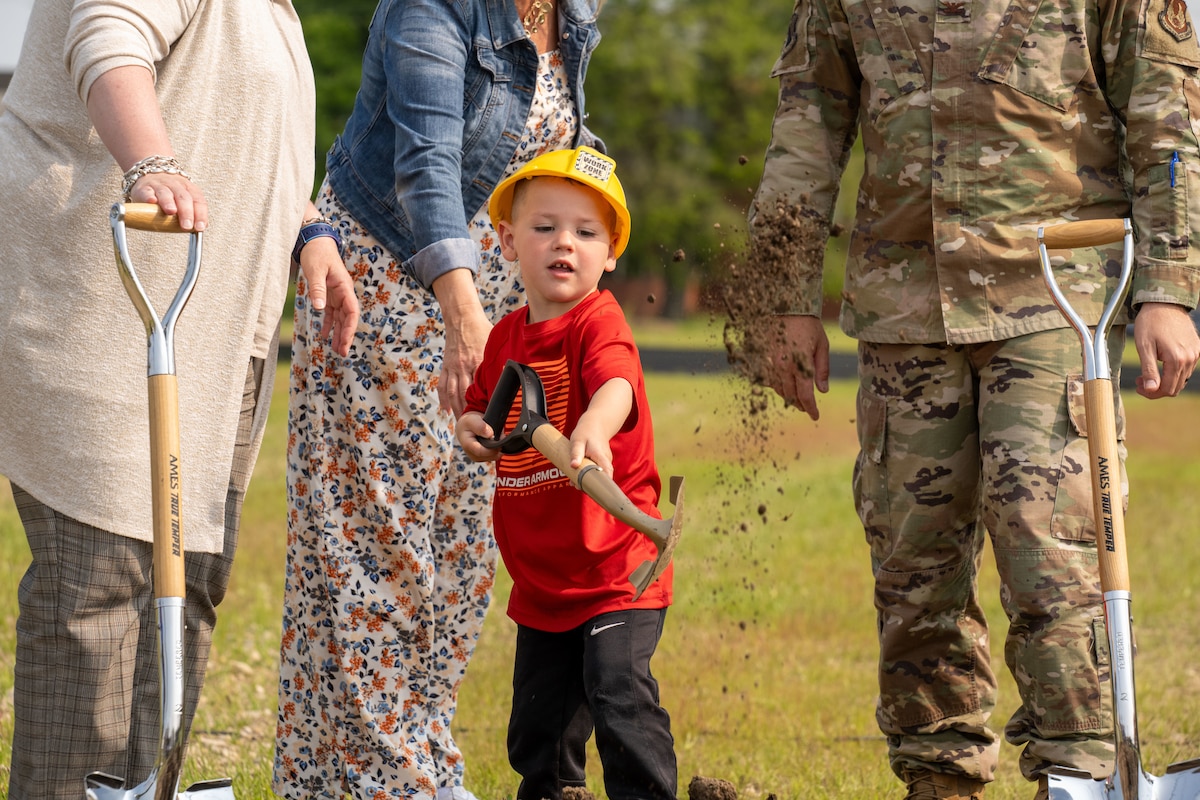 The ceremonial groundbreaking was to initiate the construction of a new child development center on base. (U.S. Air Force photo by Jack Gardner)