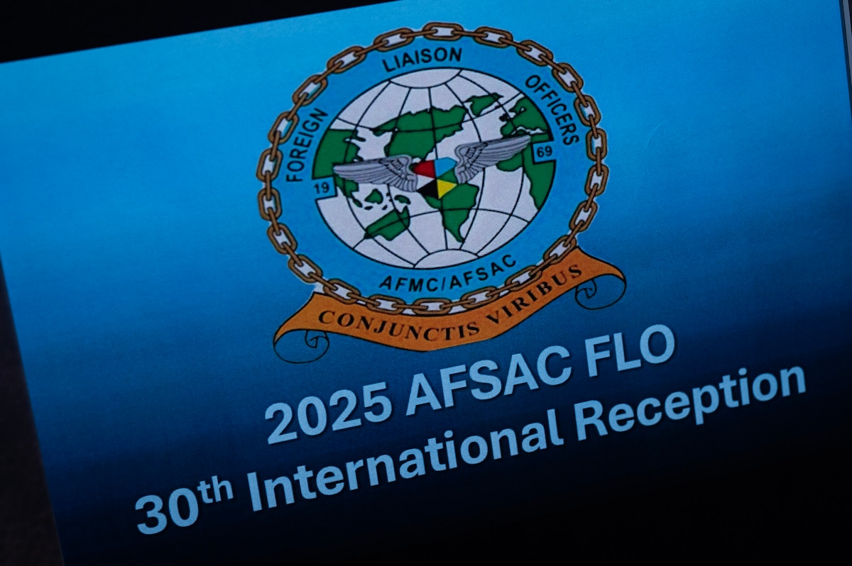 Sign says AFSAC FLO Reception 2025.