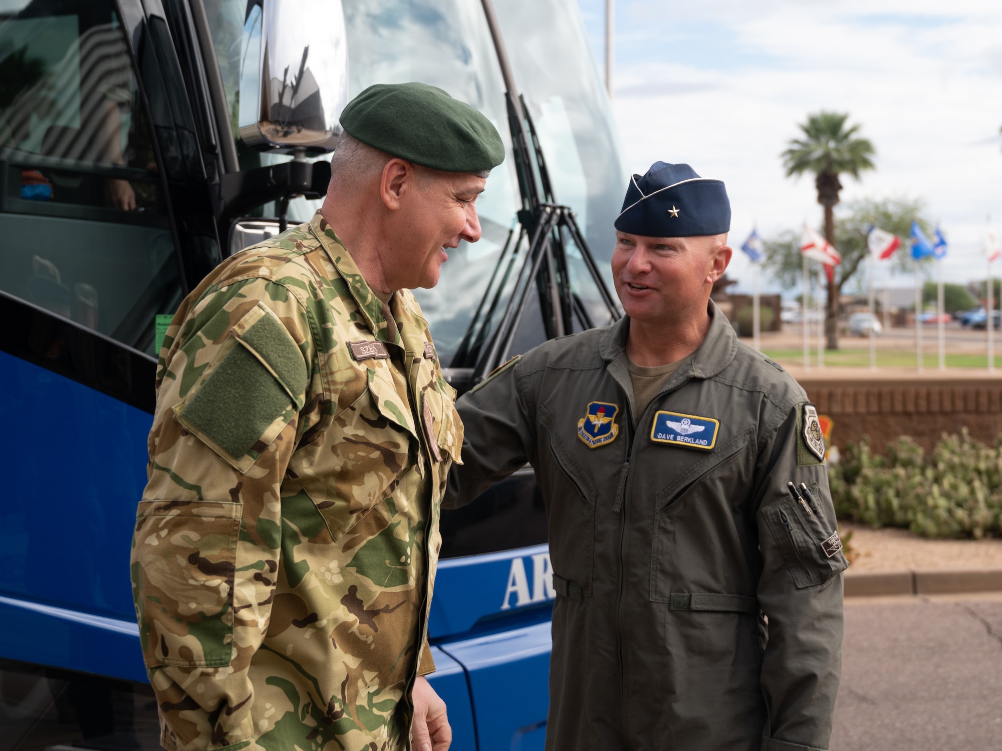 U.S. Air Force Brig. Gen. David Berkland, 56th Fighter Wing commander, greets Hungarian Air Force Brig. Gen. Laszlo Szego, Hungarian Air Force defense and air attaché, during a base visit, June 2, 2025, at Luke Air Force Base, Arizona. While at Luke, the delegation received a wing mission brief, participated in a roundtable discussion with Brig. Gen. Berkland, toured two fighter squadrons, experienced F-35 tabletop simulators, visited an F-35 aircraft, and walked the flight line. (U.S. Air Force photo by Senior Airman Elias Carrero)