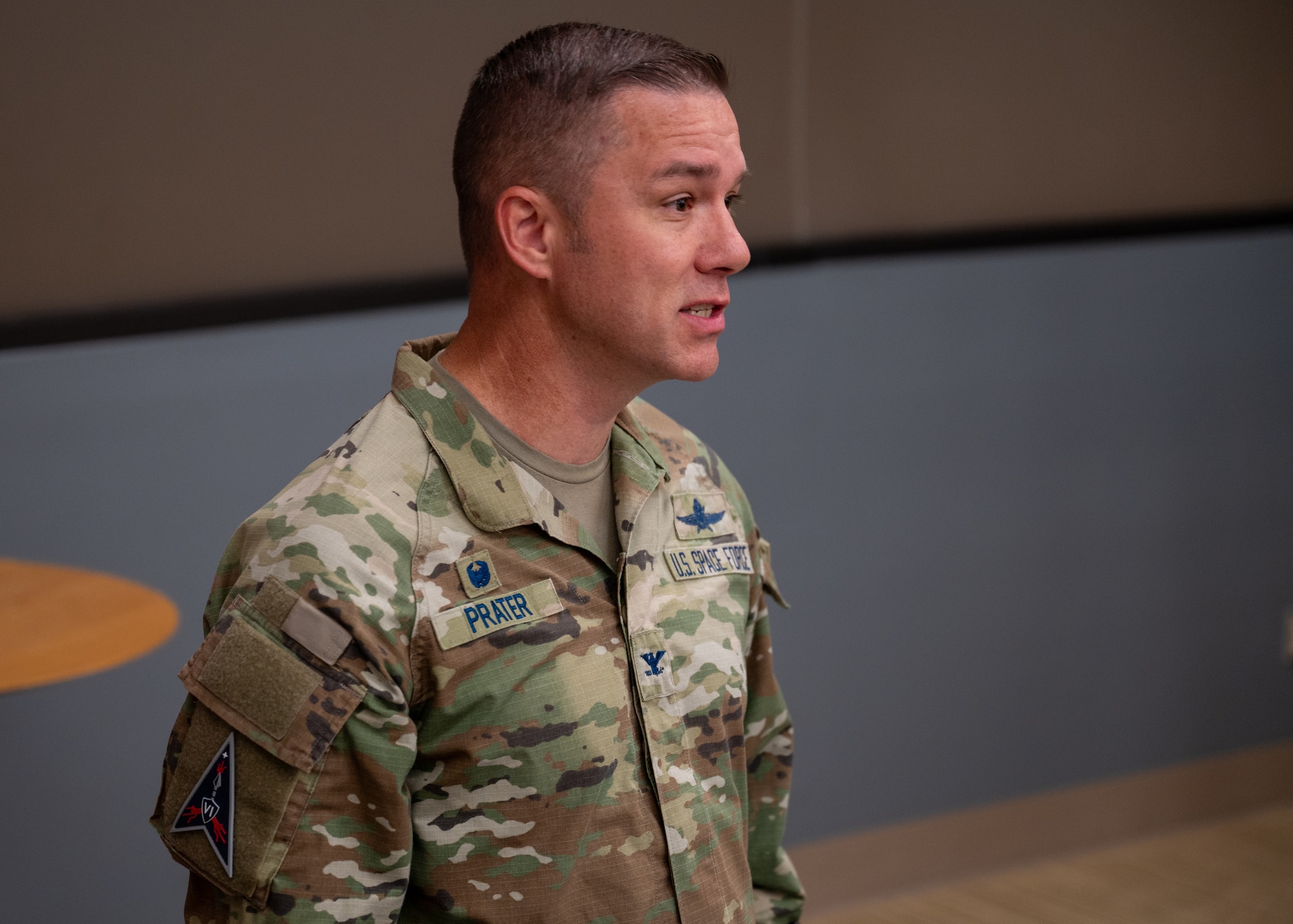 U.S. Space Force Lt. Col. Jacob Majewski, outgoing 65th Cyberspace Squadron commander, addresses attendees of the 65 CYS inactivation ceremony at Vandenberg Space Force Base, Calif., June 5, 2025. Majewski relinquished command of the 65th Cyberspace Squadron, signifying the inactivation of the unit and the activation of Space Delta 6 detachments 3 and 4.