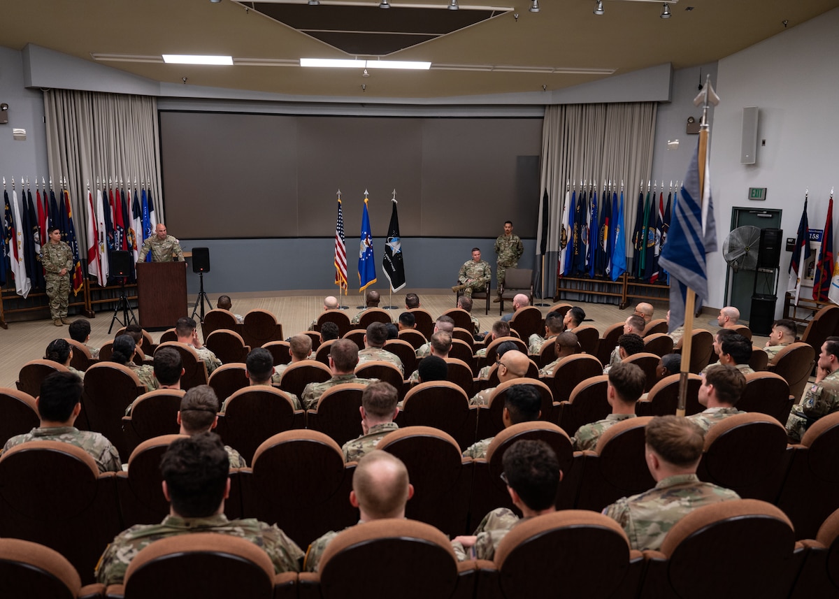 U.S. Space Force Lt. Col. Jacob Majewski, outgoing 65th Cyberspace Squadron commander, addresses attendees of the 65 CYS inactivation ceremony at Vandenberg Space Force Base, Calif., June 5, 2025. Majewski relinquished command of the 65th Cyberspace Squadron, signifying the inactivation of the unit and the activation of Space Delta 6 detachments 3 and 4.