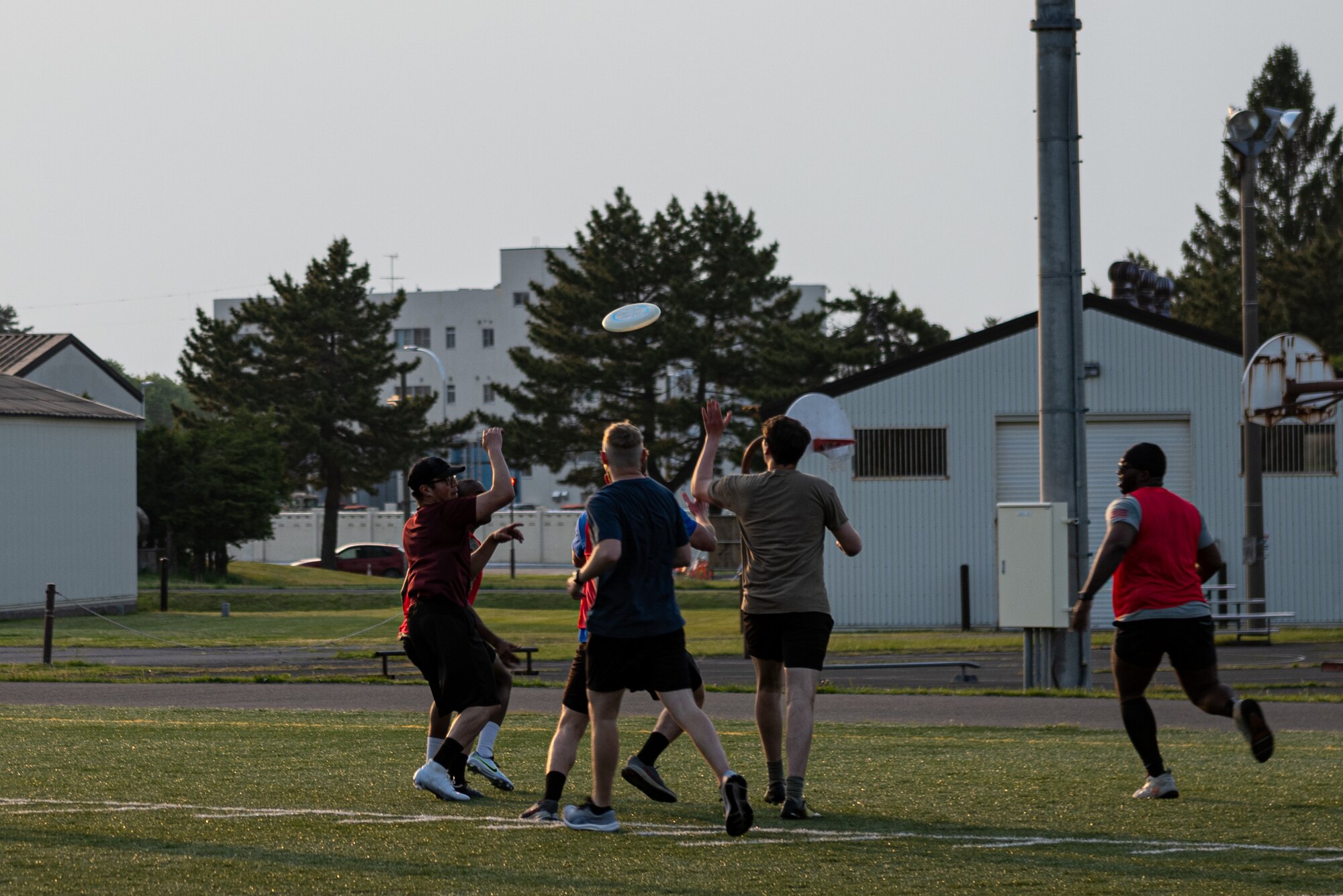 Participants of Sakura Olympics 2025 compete in a game of ultimate frisbee.