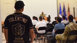 Airman 1st Class Gary Tolentino, 51st Security Forces Squadron Response Force Member, watches opening remarks to kick off MINDFUL MADNESS at Osan Air Base, Republic of Korea, May 30, 2025.