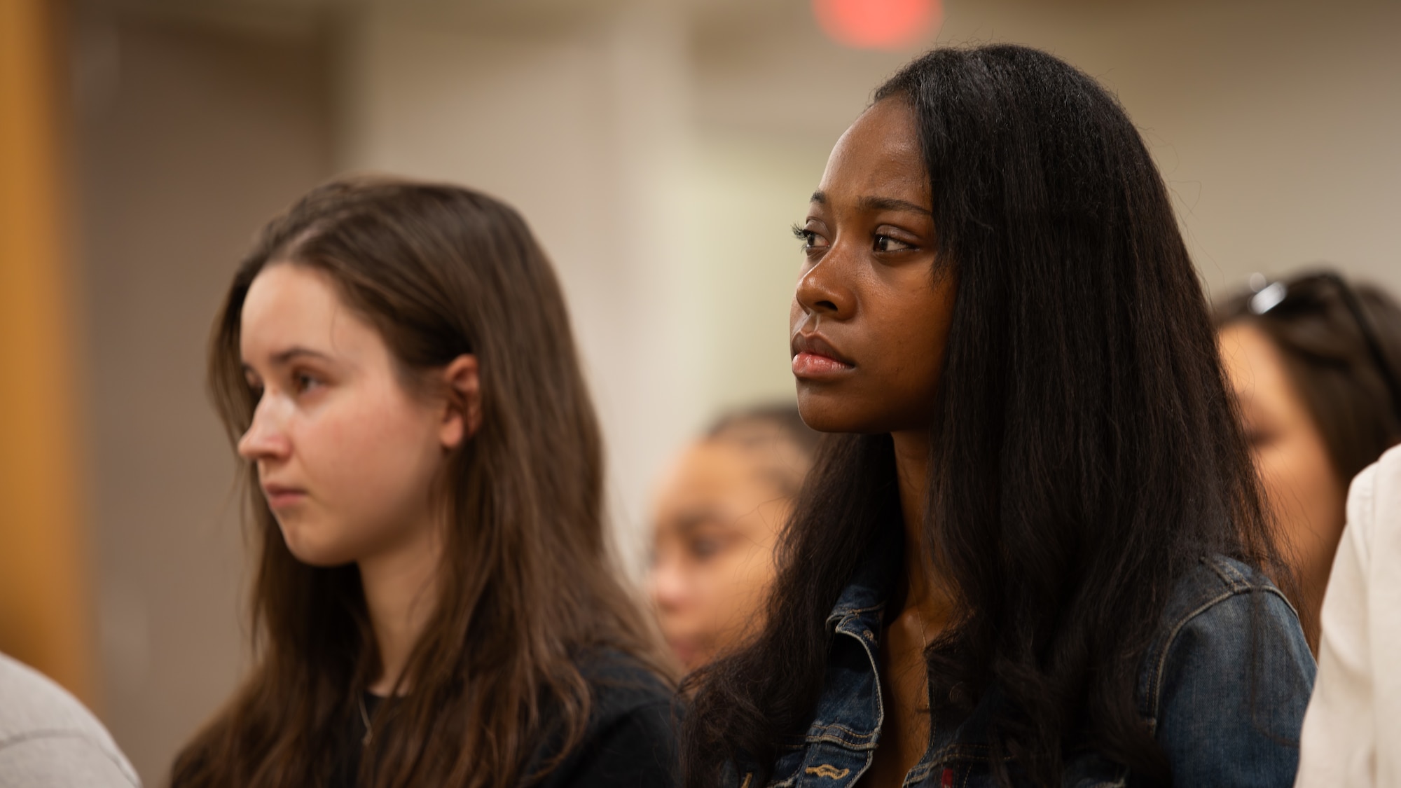 Audience members listen to guest speakers share stories about their mental health and how they sought help for MINDFUL MADNESS at Osan Air Base, Republic of Korea, May 30, 2025.