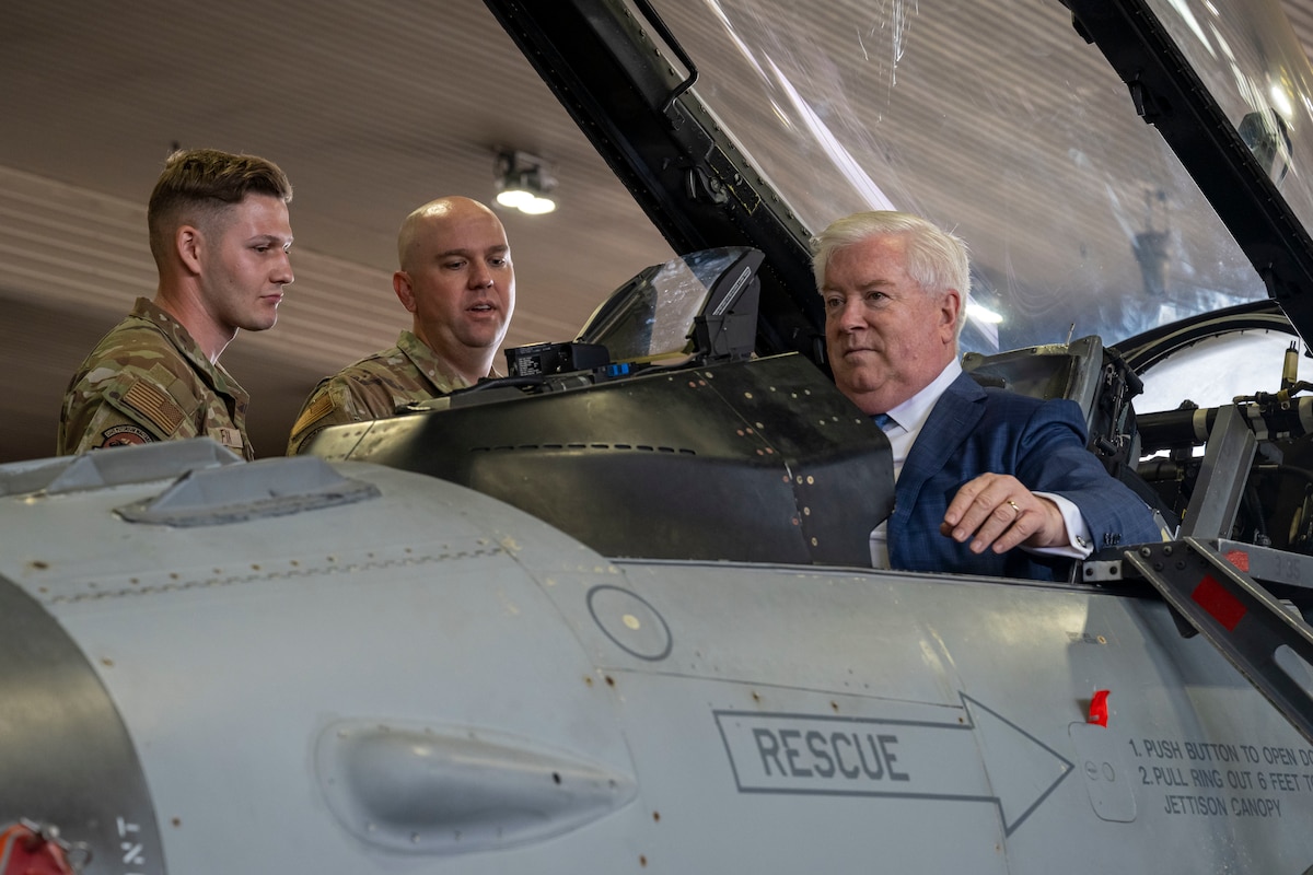 George Glass, right, U.S. Ambassador to Japan, sits in the cockpit of a U.S. F-16 Fighting Falcon at Misawa Air Base, Japan, June 5, 2025.