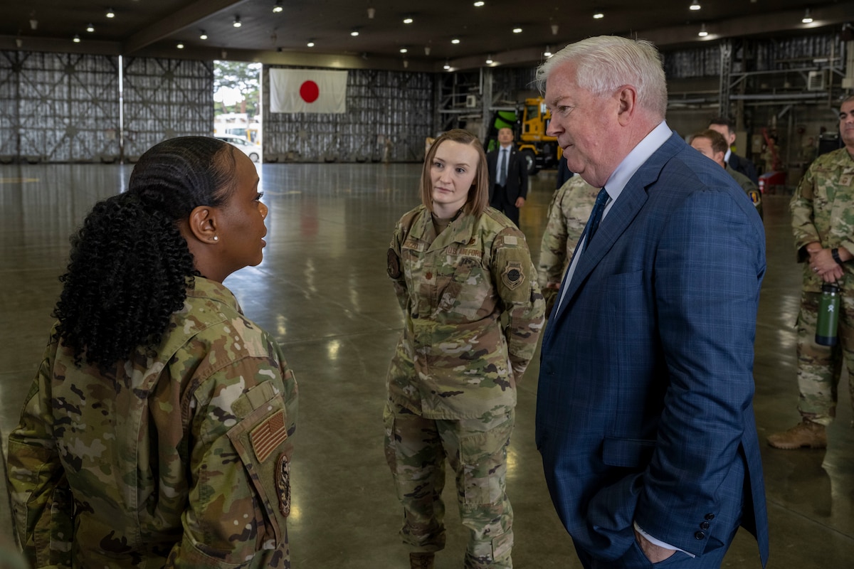 George Glass, right, U.S. Ambassador to Japan, talks with U.S. Air Force Senior Master Sgt. Mechelle Hudson, 35th Maintenance Group (MXG) senior enlisted leader, about their role at Misawa Air Base, Japan, June 5, 2025