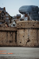 Commemorative jump at Le Mont-Saint-Michel, France