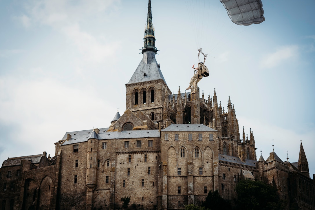 Commemorative jump at Le Mont-Saint-Michel, France