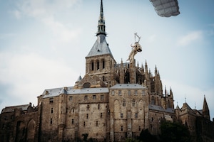 Commemorative jump at Le Mont-Saint-Michel, France
