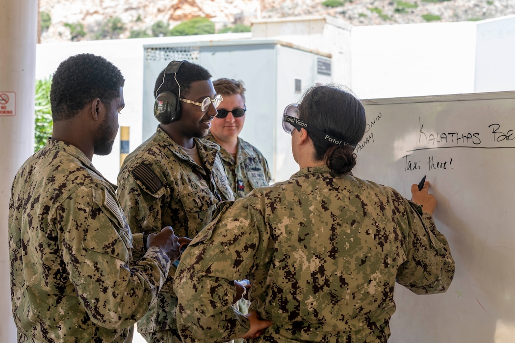 Sailors, onboard Naval Support Activity (NSA) Souda Bay, Greece, discuss having a plan during a Sailor 360 training facilitated by the Drug and Alcohol Program Advisor team on May 29, 2025.