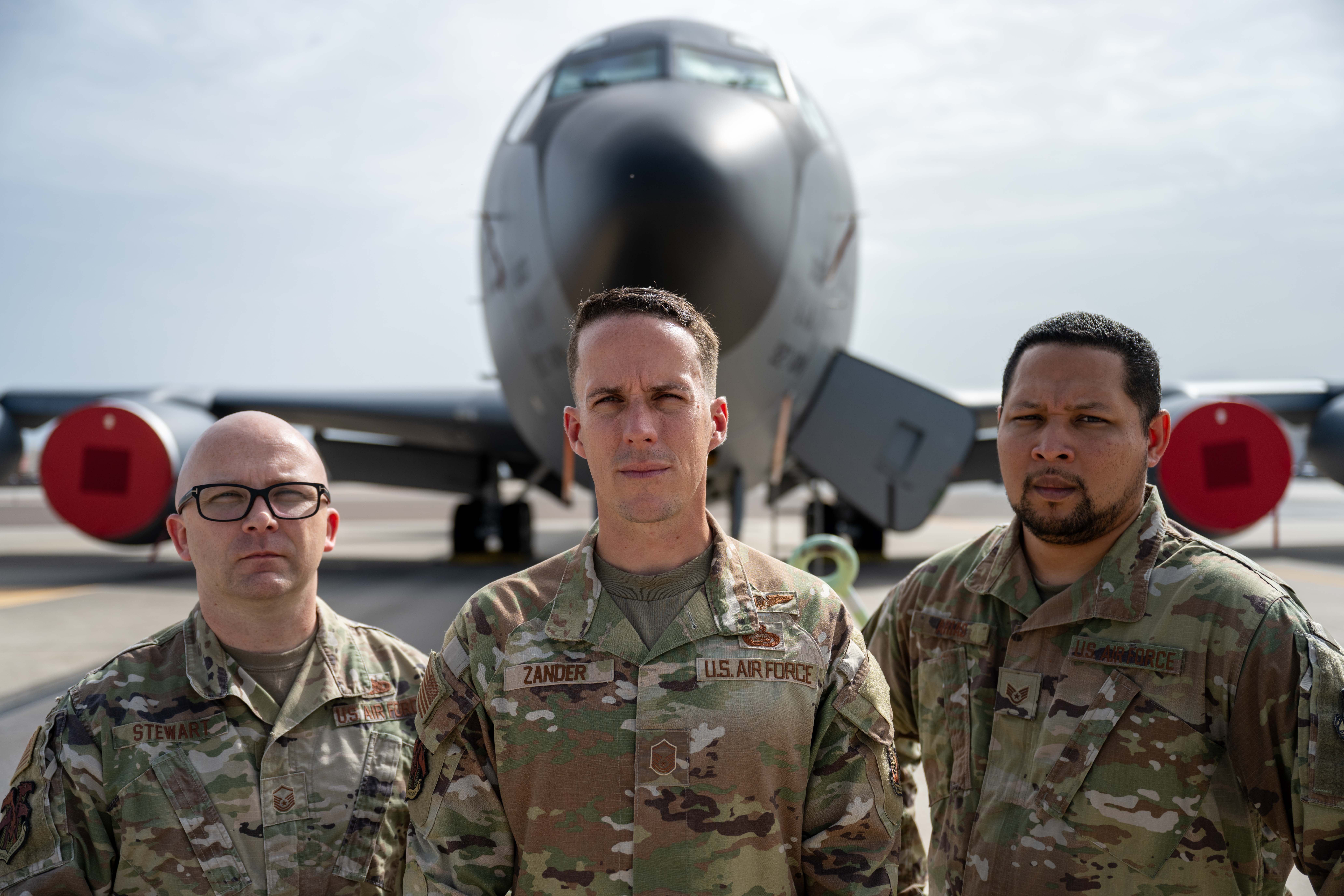 From left, U.S. Air Force Master Sgt. Joshua Stewart, Master Sgt. Jordan Zander and Staff Sgt. Geovanny Arias, Airmen assigned to the 6th Maintenance Group, pose for a photo in front of a KC-135 Stratotanker at MacDill Air Force Base, Florida, June 5, 2025. Arias and Zander were recently named 2024 18th Air Force Maintenance Training Managers of the Year for the noncommissioned and senior noncommissioned officer (SNCO) categories, and Stewart received the 2024 Air Mobility Command Maintenance Manager of the Year award for the SNCO category. (U.S. Air Force photo by Senior Airman Derrick Bole)