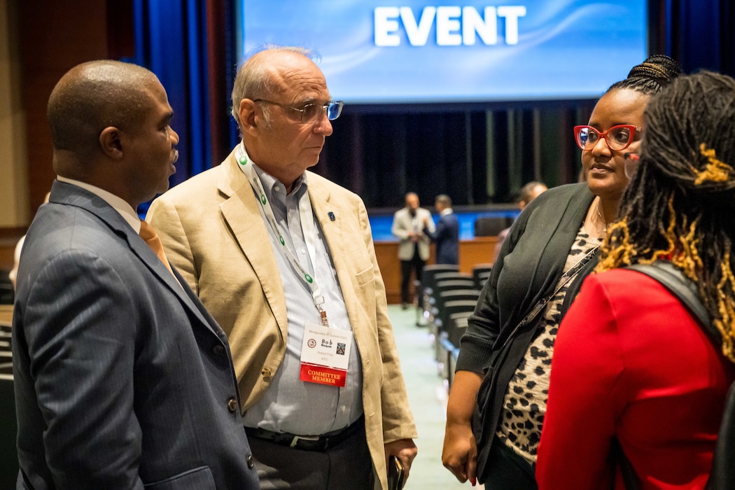 Business and Enterprise Systems personnel engage with VID 2025 attendees at the Networking Event.