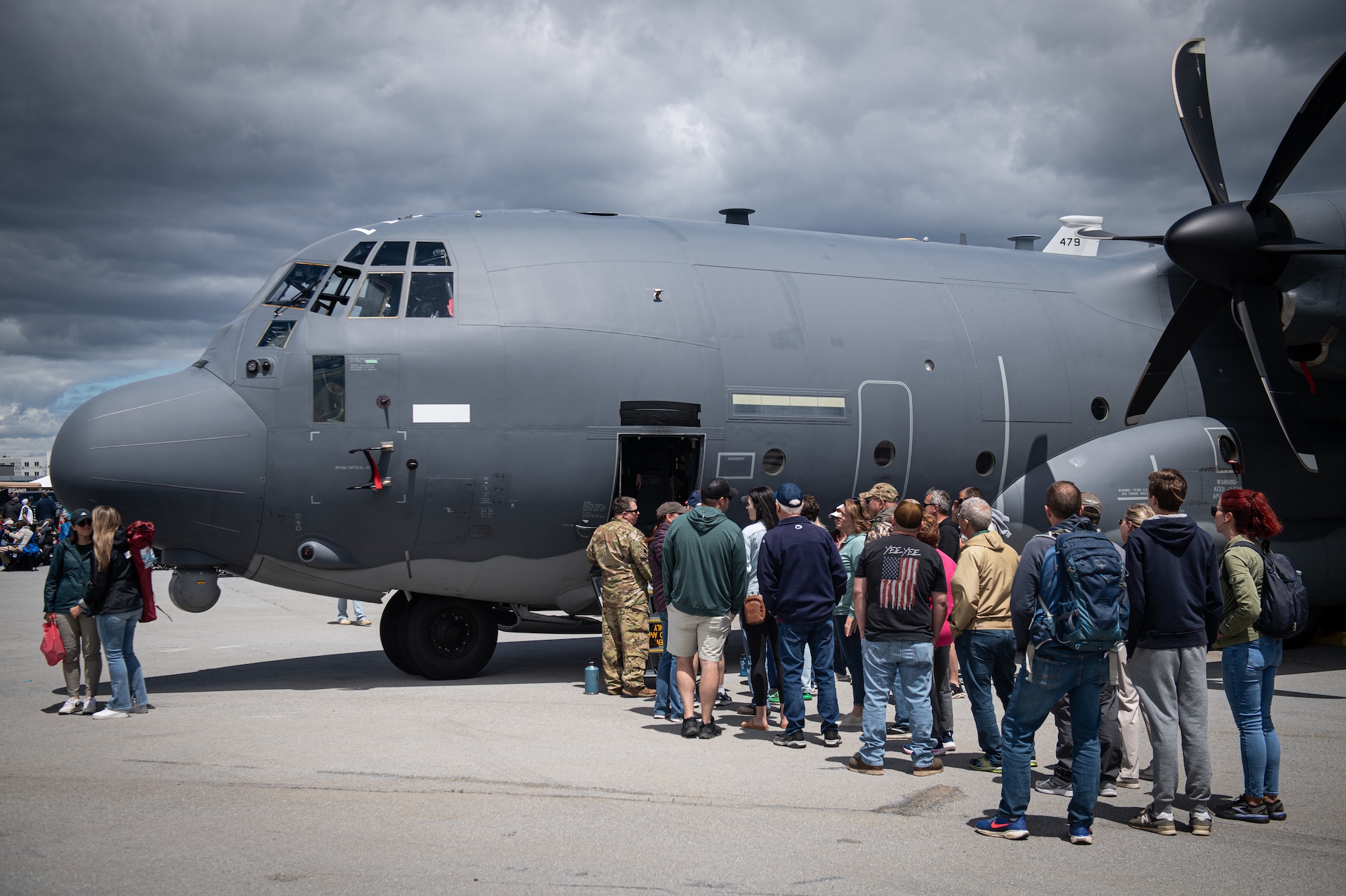 Air show patrons wait in line to tour an MC-130J Commando II from the 193rd Special Operations Wing during an air show at Harrisburg International Airport in Middletown.