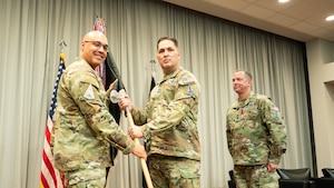 U.S. Space Force Lt. Gen. David N. Miller, Jr., commander of Space Operations Command, passes the colors to Chief Master Sgt. Michael J. Rozneck, the incoming Command Senior Enlisted Leader during a CSEL Change of Responsibility ceremony at Peterson Space Force Base, Colo., June 6, 2025.  The Command Senior Enlisted Leader advises the commander on mission effectiveness, professional development, and military readiness and training of all assigned and attached enlisted space forces enabling the preparation, generation and sustainment of combat-ready intelligence, cyber, space and combat support forces.