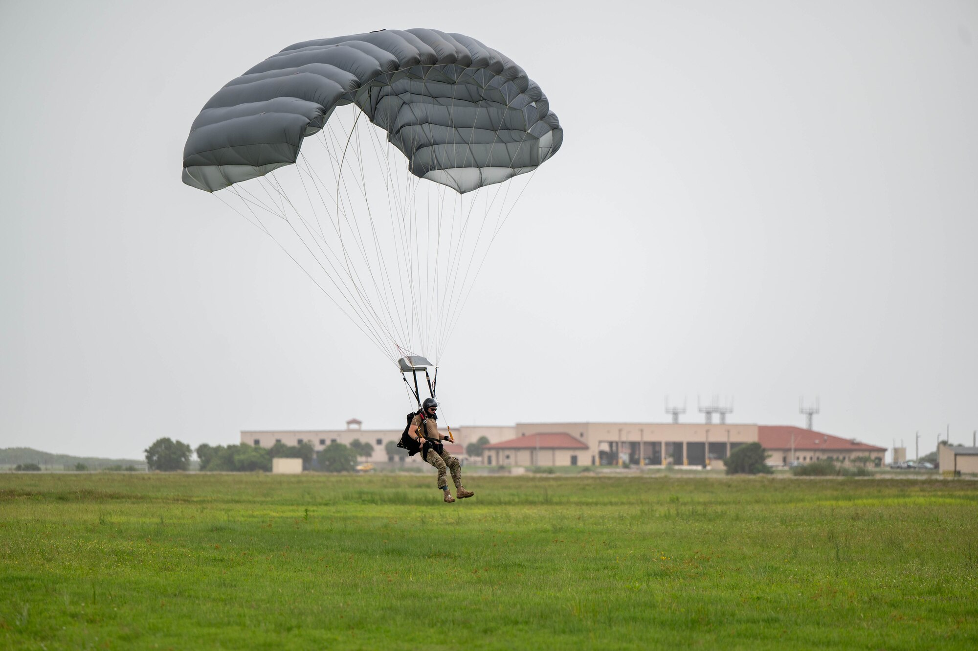 A pararescue specialist prepares to land