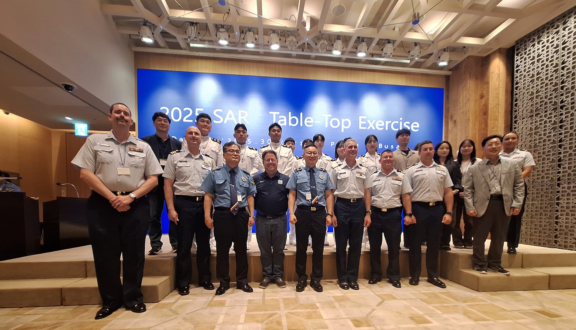Legend-class U.S. Coast Guard Cutter Stratton (WMSL 752) crew members pose with international coast guard partners at the 2025 search and rescue seminar and  table-top exercise in Busan, Republic of Korea, May 30, 2025. Event attendees from ten different countries gathered to observe U.S. Coast Guard–Republic of Korea Coast Guard–Japan Coast Guard-focused maritime incident response and case study review. Stratton is deployed and assigned to Destroyer Squadron (DESRON) 15, the Navy’s largest DESRON and the U.S. 7th Fleet’s principal surface force. U.S. Coast Guard Cutter Stratton is deployed to the Indo-Pacific to advance relationships with ally and partner nations to build a more secure and prosperous region with unrestricted, lawful access to the maritime commons. (U.S. Coast Guard photo by Ensign Daniel Unangst)