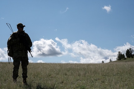 A Security Forces Airman conducts a patrol during a field training exercise at  Ft. William Henry Harrison, Helena, Mont., June 2, 2025.