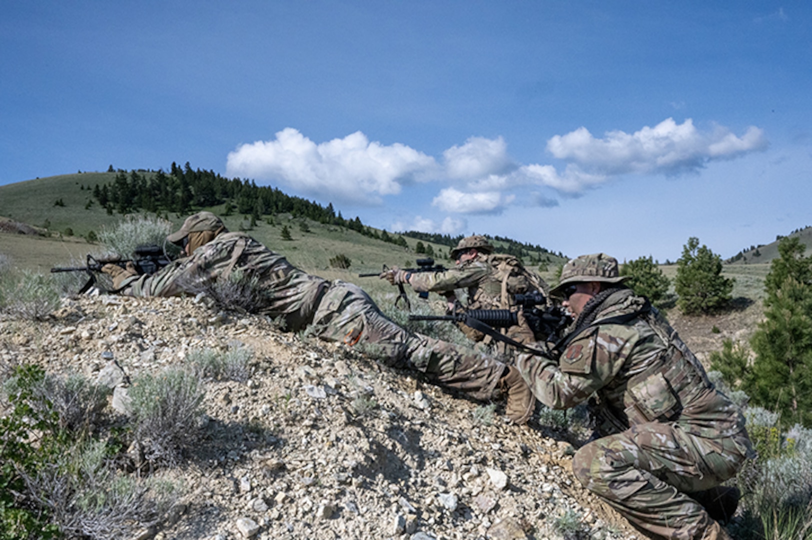 Security Forces Airmen respond to a simulated attack during a field training exercise at  Ft. William Henry Harrison, Helena, Mont., June 4, 2025.