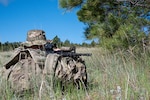 A Security Forces Airman responds to a simulated attack during a field training exercise at Ft. William Henry Harrison, Helena, Mont., June 2, 2025. Security Forces Squadrons from Arizona and Pennsylvania traveled to the Fort for a week of field training. The field instruction consisted of patrol movements, base security, key leader engagements, chemical, biological, radiological, nuclear and explosives detection response, and simulated attacks from opposition forces.
