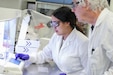 DEVCOM CBC Bioengineering Researcher Priscilla Lee and DEVCOM CBC Senior Biologist Ted Moran use a bioprinter capable of creating synthetic skin at a DEVCOM CBC laboratory at Aberdeen Proving Ground, Maryland.