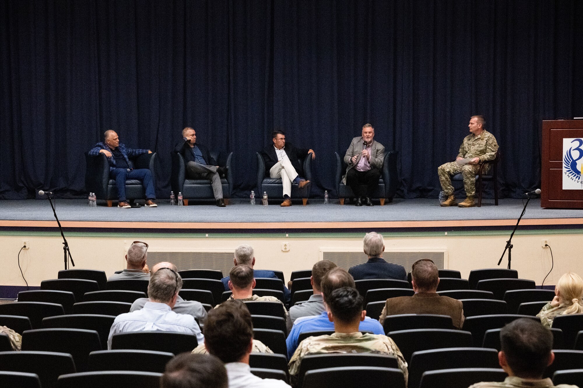A group of past and present AFSOC leaders speak on a panel.