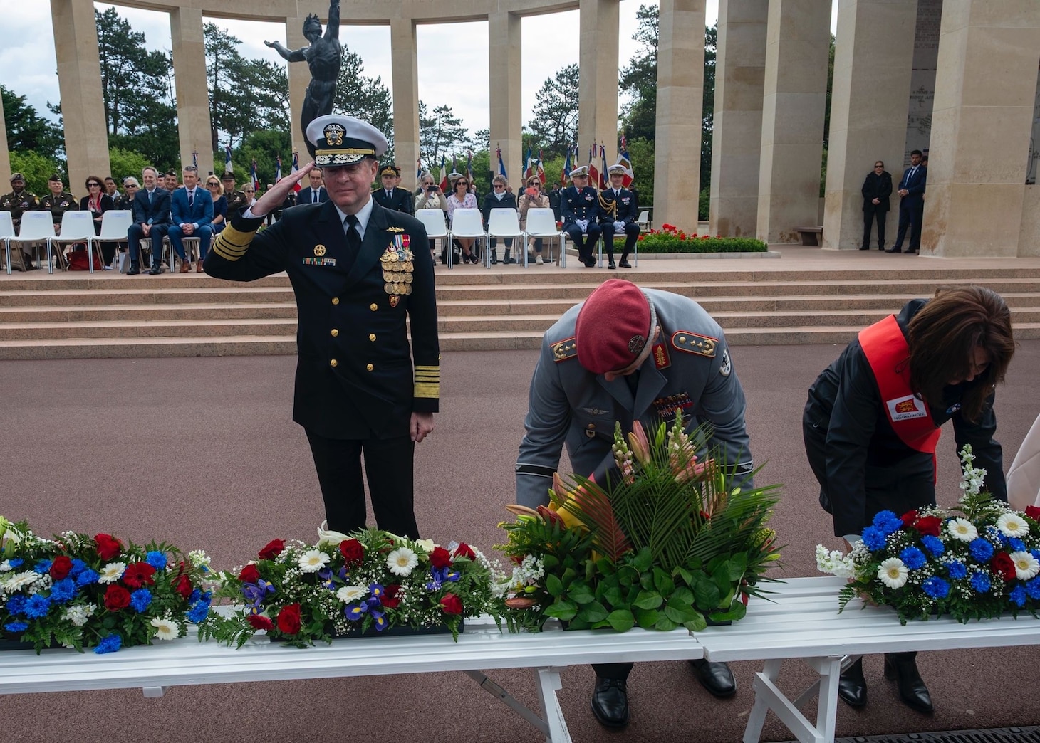 Adm. Stuart B. Munsch, commander of U.S. Naval Forces Europe (NAVEUR), lays a wreath at the Normandy American Cemetery ceremony during the 81st commemoration of the D-Day landings.