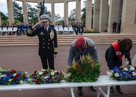 Adm. Stuart B. Munsch, commander of U.S. Naval Forces Europe (NAVEUR), lays a wreath at the Normandy American Cemetery ceremony during the 81st commemoration of the D-Day landings.