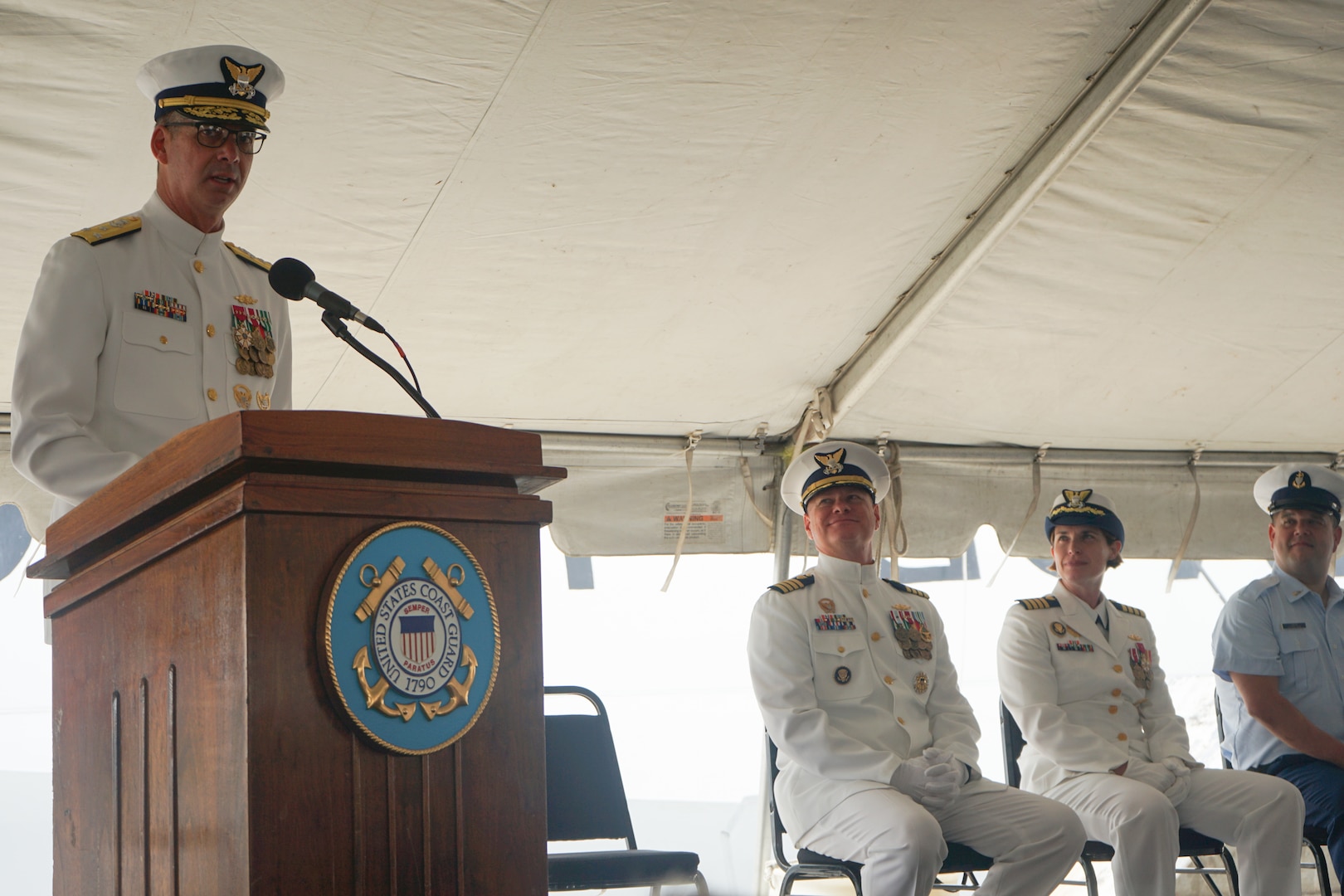 Vice Adm. Nathan Moore, commander, Atlantic Area, delivers remarks as presiding official at Coast Guard Cutter Stone's (WMSL 758) change-of-command ceremony in North Charleston, South Carolina, June 5, 2025. Capt. Anne O’Connell relieved Capt. Jonathan Carter as the fourth commanding officer of Stone during the ceremony, which was presided over by Moore in front of the assembled crew and distinguished guests. (U.S. Coast Guard photo by Ensign Sarah Pearson)