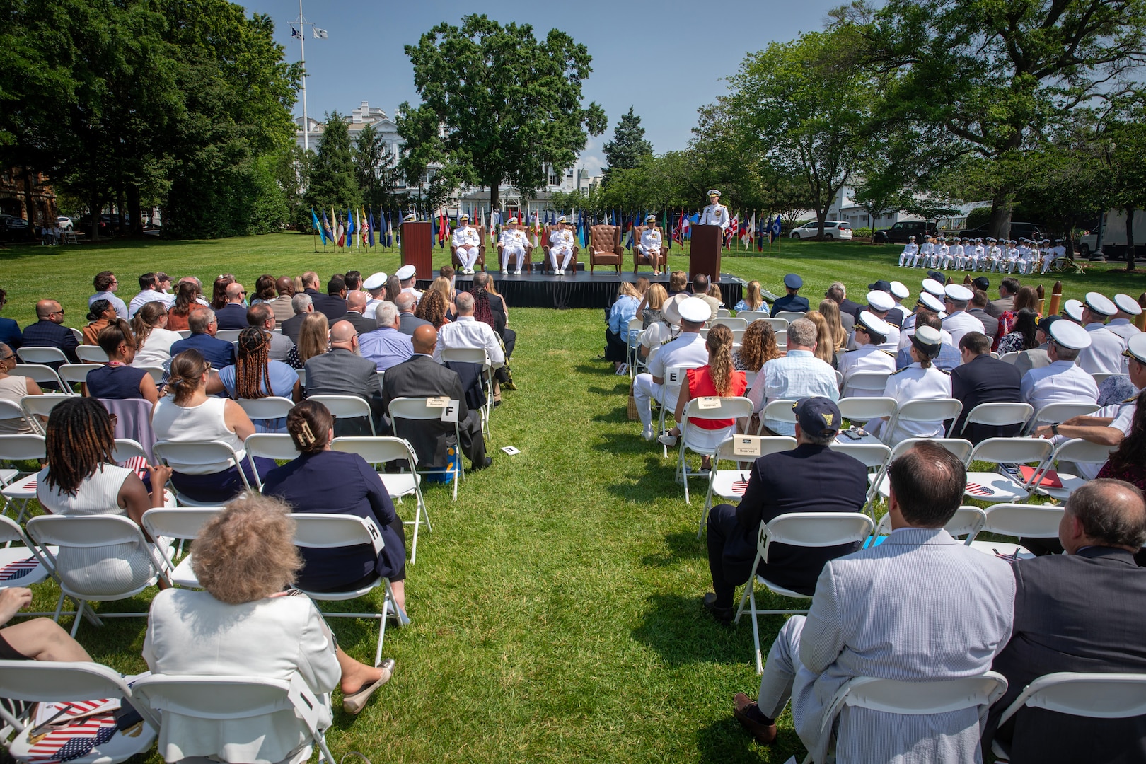 Friends, family, and coworkers, attend a Surface Ship Maintenance, Modernization, and Sustainment (SEA 21) change of office ceremony at the Washington Navy Yard’s Leutze Park, June 6. During the ceremony, Rear Adm. William Greene was relieved by Rear Adm. Andrew Biehn. SEA 21 is the dedicated life cycle management organization for the Navy's in-service surface ships and is responsible for managing critical modernization, maintenance, training and inactivation programs