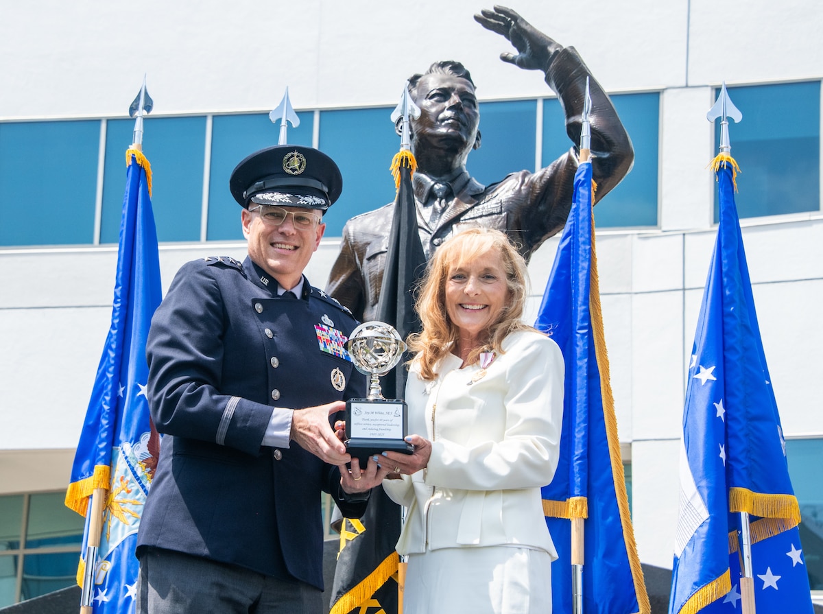 U.S. Space Force Lt. Gen. Philip Garrant, commander of Space Systems Command (SSC), presents an award to Ms. Joy White, a member of Senior Executive Service and executive director of SSC, on May 29, 2025, at Los Angeles Air Force Base in honor of her retirement after 40 years of exemplary federal service. White served as the top-ranking civilian at Space Systems Command from 2016 through her official retirement date of May 31, 2025.