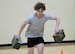 A high school student powers through the ammo can relay during a U.S. Army Fitness Challenge event in the Kansas City area, May 2025. The event, hosted by the U.S. Army Recruiting Battalion Kansas City, encouraged physical fitness and team-building through hands-on activities.