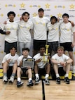 Shawnee Mission West High School students pose with their championship trophy and “Army Fit Certified School” plaque after winning the U.S. Army Fitness Challenge in May 2025. The event, hosted by the U.S. Army Recruiting Battalion Kansas City, tested strength, speed, and teamwork through competitive fitness events.