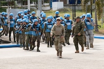 U.S. Air Force Staff Sgt. Maritza Garcia, 154th Medical Group Detachment 1 medic and Tactical Combat Casualty Care instructor, guides Armed Forces of the Philippines students during a medical field training exercise May 29, 2025, at Camp O’Donnell, Philippines.