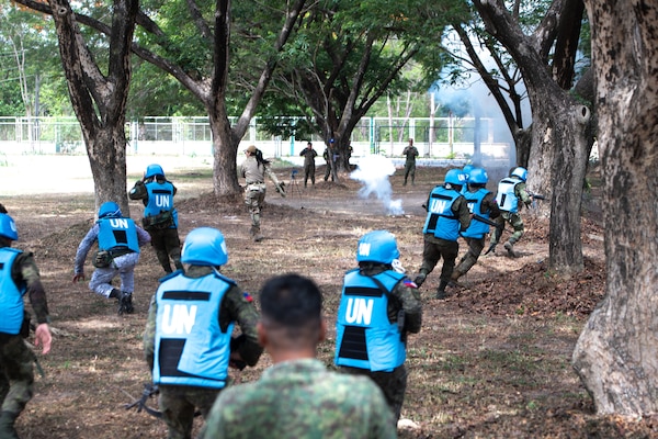 Armed Forces of the Philippines members disperse in response to a simulated improvised explosive device during a Tactical Combat Casualty Care field training exercise May 29, 2025, at Camp O’Donnell, Philippines.