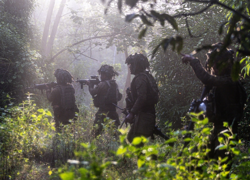 Philippine Army Soldiers assigned to 71st Infantry Battalion, 702nd Brigade, 7th Infantry Division, move to an objective during Salaknib 25 at Fort Magsaysay, Philippines, June 6, 2025.