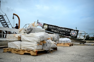 Drugs offloaded from USCGC Vigorous sit on pallets at Coast Guard Base Miami Beach