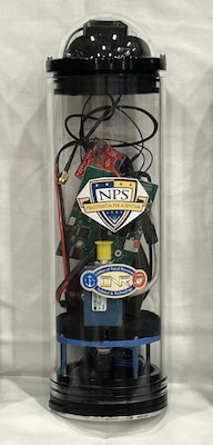 Invented by NPS faculty Benjamin Reeder, the cryophone shown on the left can detect soundwaves traveling though the ice. (Courtesy photo from Benjamin Reeder)