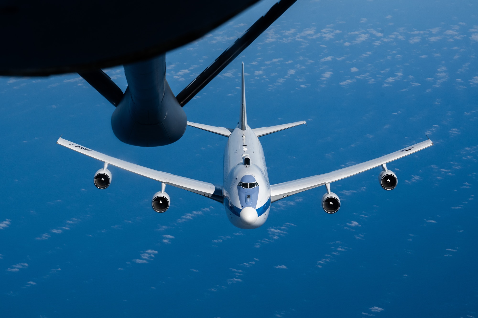 A U.S. Air Force E-4B Nightwatch  from the 95th Wing, Offutt Air Force Base, Neb., descends after receiving fuel from a KC-135 Stratotanker from the 100th Air Refueling Wing, RAF Mildenhall, England, over the Atlantic, May 16, 2025.