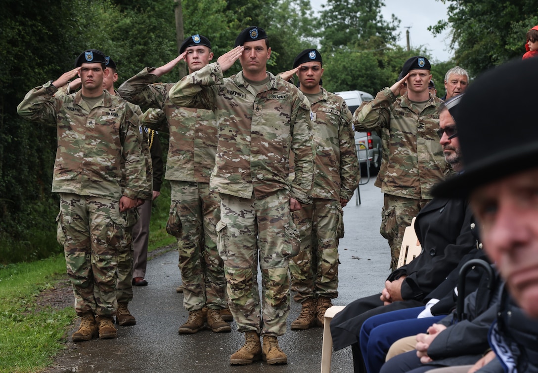 Soldiers from V Corps' Best Squad, assigned to the 2nd Cavalry Regiment, render honors during a ceremony at the Eisenhower Monument near the Father Maternowski Memorial in Amfreville, France, June 7, 2025. The ceremony commemorated the 81st anniversary of D-Day and honored Gen. Dwight D. Eisenhower’s enduring legacy of leadership, unity, and sacrifice. (U.S. Army photo by Sgt. Tyler Brock)