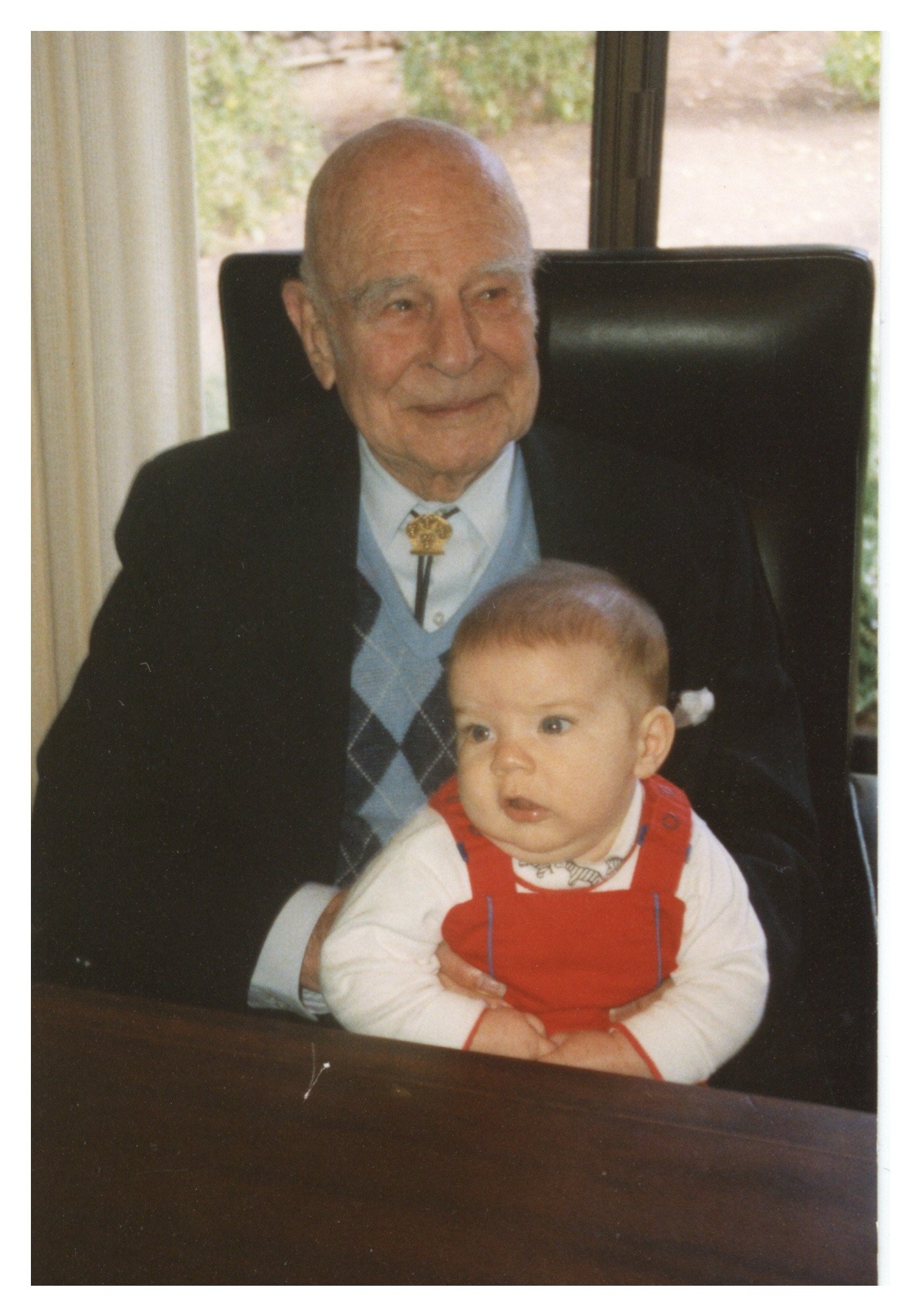 A family photo portrays the late U.S. Army Air Corps Gen. James “Jimmey” Doolittle, as he holds his great grandnephew, James Doolittle, the brother of U.S. Air Force Tech Sgt. Michelle Doolittle. Gen. Doolittle is remembered as the former 8th Air Force commander and leader behind the Doolittle Raid against Japan in 1942.