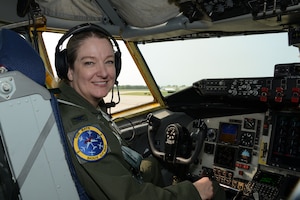 U.S. Air National Guard Col. Sonya Morrison, outgoing 185th Air Refueling Wing Commander, poses for a photo in the pilot’s seat of a U.S. Air Force KC-135 Stratotanker