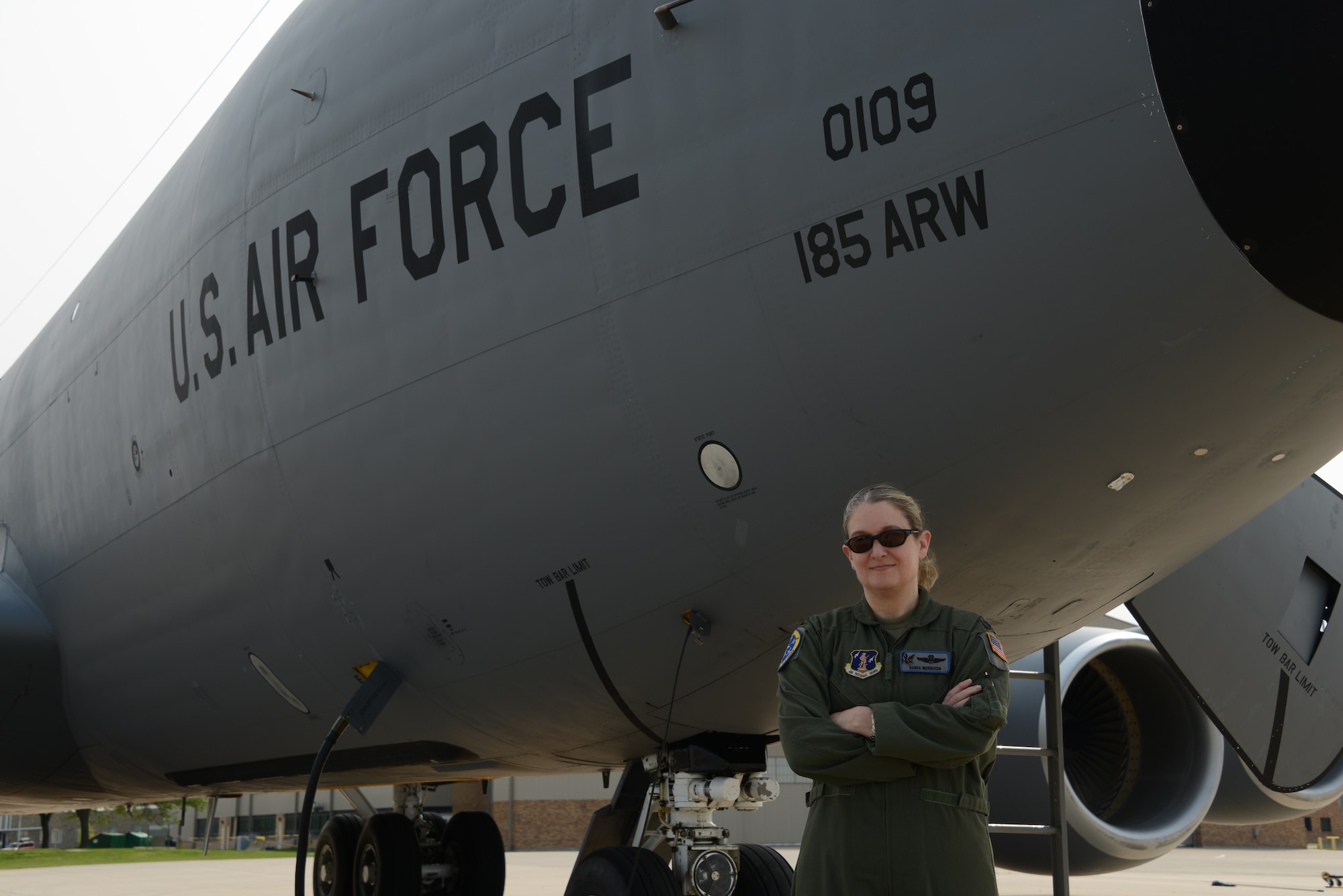 U.S. Air National Guard Col. Sonya Morrison, outgoing 185th Air Refueling Wing Commander, poses for a photo in front of a U.S. Air Force KC-135 Stratotanker