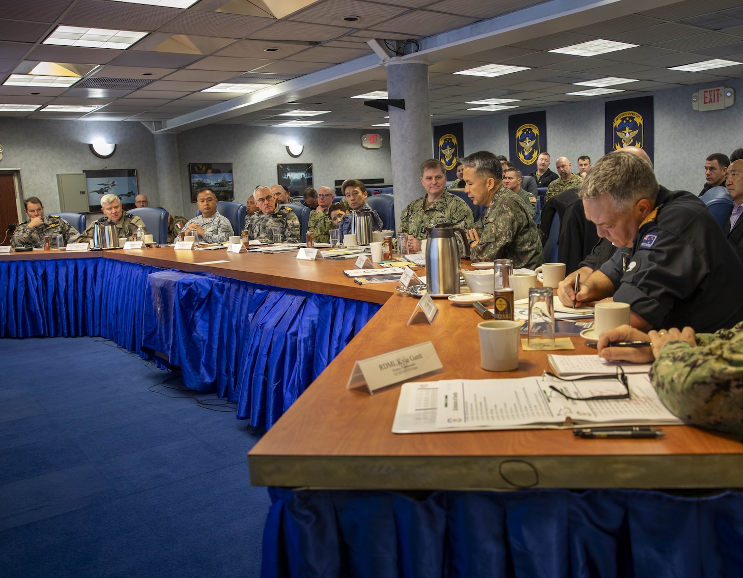 250530-N-WM182-1099 SYDNEY (May 30, 2025) Republic of Korea (ROK) Navy Rear Adm. Ji Hoon Kim, Deputy Commander, ROK Navy Fleet, speaks during a gathering of naval leaders from Australia, Canada, France, Japan, the Republic of Korea, New Zealand, the Philippines, and the U.S. aboard the U.S. 7th Fleet flagship USS Blue Ridge (LCC 19) for the Fleet Commanders' Round Table in Sydney while the ship conducts a scheduled port visit, May 30, 2025. 7th Fleet is the U.S. Navy's largest forward-deployed numbered fleet, and routinely interacts and operates with allies and partners in preserving a free and open Indo-Pacific region. (U.S. Navy Photo by Mass Communication Specialist 1st Class Caitlin Flynn)