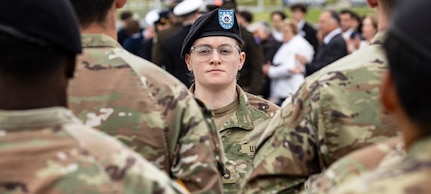 Sgt. 1st Class Taylor Prohammer, noncommissioned officer in charge of the V Corps Color Guard, stands in formation during the Allied Ceremony at the Eisenhower Statue in Bayeux, France, June 5, 2025. The event highlighted the enduring strength of multinational military cooperation forged on D-Day and carried forward through modern Allied partnerships. (U.S. Army photo by Sgt. Tyler Brock)