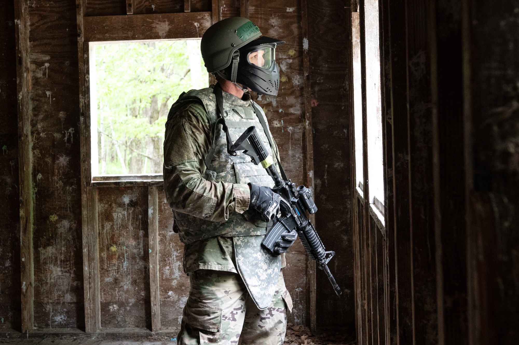 U.S. Air Force Chief Master Sgt. Lars Fricke from the 133rd Logistics Readiness Squadron takes the role of an enemy role player in Camp Ripley, Minn., May 17, 2025.