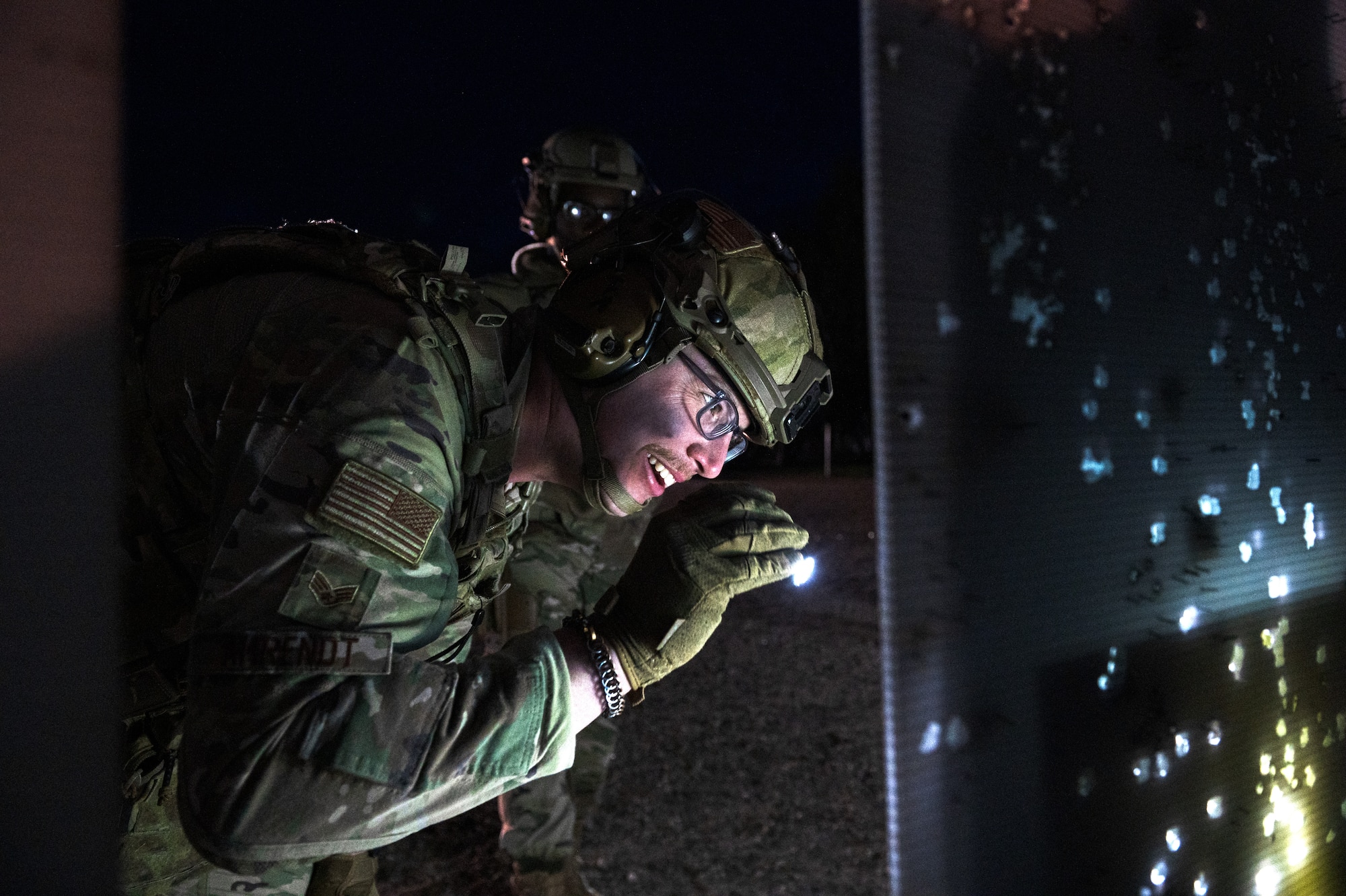 U.S. Air Force Senior Airman Tyler Ahrendt from the 133rd Security Forces Squadron, Minnesota Air National Guard, evaluates his precision in Camp Ripley, Minn., May 18, 2025.